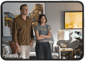 iPhone Duo, opened in horizontal position, Apple TV show "Shrinking" plays on screen